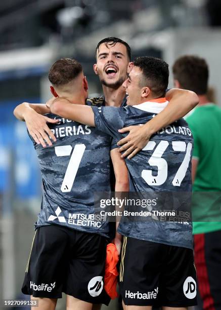 Wanderers players celebrate at full-time during the A-League Men round 12 match between Melbourne City and Western Sydney Wanderers at CommBank...