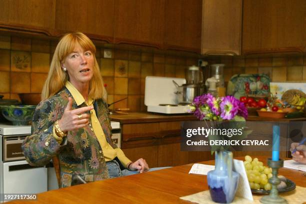 Annika Einhorn, wife of accused murderer US Ira Einhorn, poses 11 October 2002 in the kitchen of the home she shared with Einhorn until his...