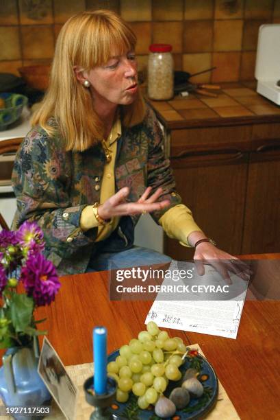 Annika Einhorn, wife of accused murderer US Ira Einhorn, poses 11 October 2002 in the kitchen of the home she shared with Einhorn until his...