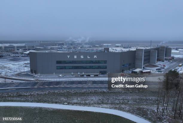 In this aerial view the Tesla Gigafactory that produces electric cars stands on January 12, 2024 near Gruenheide, Germany. The factory will...