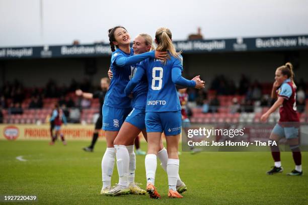 Libby Smith of Birmingham City celebrates with teammates Choe Yu-Ri and Jamie Finn after scoring their team's first goal during the Adobe Women's FA...