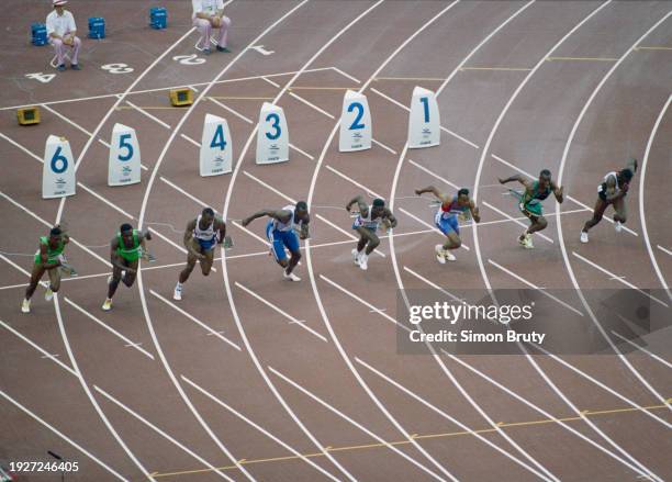 Bruny Surin of Canada, Raymond Stewart of Jamaica, silver medal winner Frankie Fredericks of Namibia, bronze medal winner Dennis Mitchell of United...