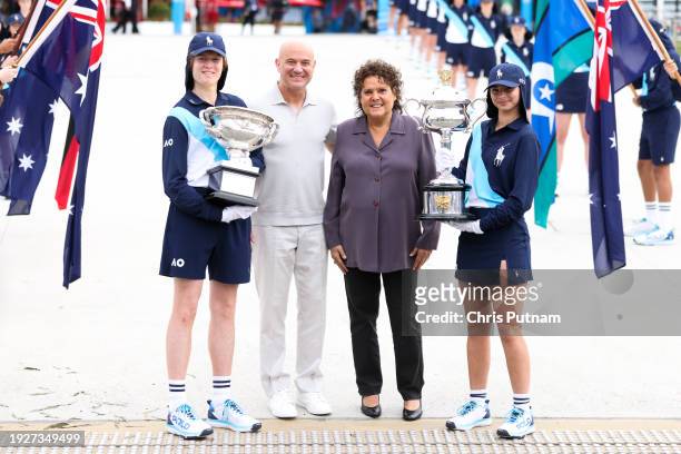 Andre Agassi and Evonne Goolagong Cawley pose with the Norman Brookes Challenge Cup and the Daphne Akhurst Memorial Cup at the trophy arrival...