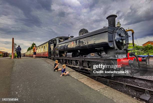 the severn valley steam and diesel heritage railway at kidderminster station shropshire. england uk. it is a warm sunny day. - history and progress of the steam engine stock pictures, royalty-free photos & images