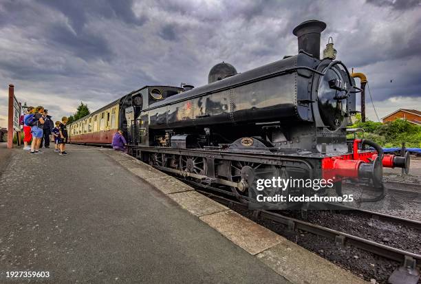 the severn valley steam and diesel heritage railway at kidderminster station shropshire. england uk. it is a warm sunny day. - history and progress of the steam engine stock pictures, royalty-free photos & images