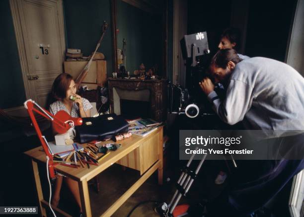 French actress Judith Godreche with French director, screenwriter and writer Benoit Jacquot on the set of "La Desenchantee" . August 1989.