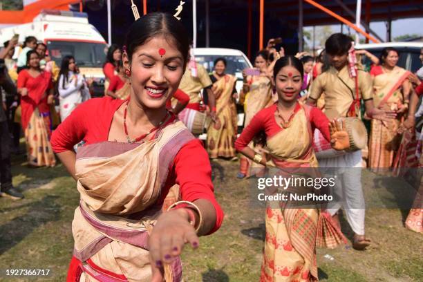 Girls are performing the traditional Assamese Bihu dance during Bhogali Bihu celebrations in Nagaon District, Assam, India, on January 15, 2024.