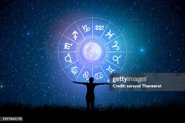 zodiac signs inside of horoscope circle. astrology in the sky with many stars and moons astrology and horoscopes concept - astrologie photos et images de collection