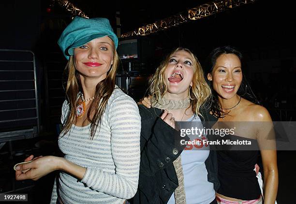 Actors Cameron Diaz, Drew Barrymore and Lucy Liu mingle backstage during Nickelodeon's 16th Annual Kids' Choice Awards at the Barker Hangar April 12,...