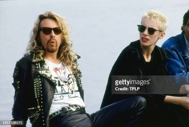 Portrait of New Wave and Pop musicians Dave Stewart and Annie Lennox, both of the duo Eurythmics, during an interview at the Montreux Rock Festival,...