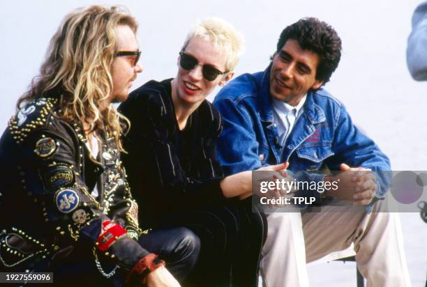 View of, from left, New Wave and Pop musicians Dave Stewart and Annie Lennox, both of the duo Eurythmics, and DJ Gary Davies during an interview at...
