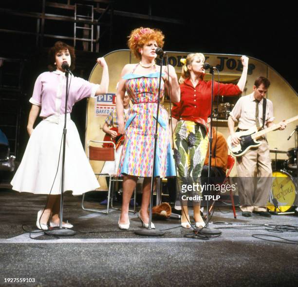 View of, fore from left, British actors Tracey Perry, Eve Ferret, and Denise Welch as they perform, as 'The Chicks,' in a production of 'Yakety Yak'...
