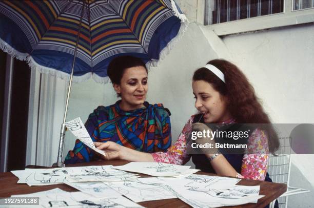 Princess Dina Abdul-Hamid of Jordan , the former wife of King Hussein, with their daughter Princess Alia in London, England, July 21st 1967....