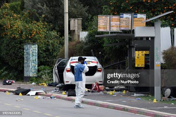 Israeli security forces are inspecting the scene of a terror attack in Raanana, Israel, on January 15, 2024. An Israeli woman has been killed and at...