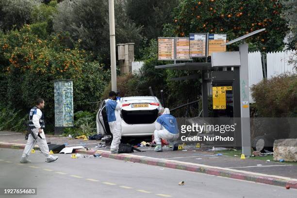 Israeli security forces are inspecting the scene of a terror attack in Raanana, Israel, on January 15, 2024. An Israeli woman has been killed and at...