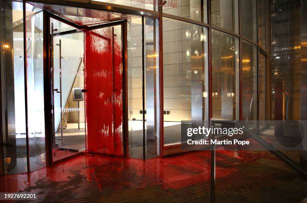 Covert action by activists from Palestine Action leaves red paint covering the entrance doors of Scotia Banking's offices on January 15, 2024 in...