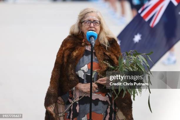 Joy Murphy Wandin at smoke ceremony during the trophy arrival ceremony on Day 1 of the 2024 Australian Open at Melbourne Park.