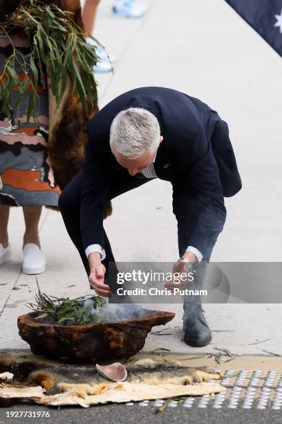 Tournament director Craig Tiley at smoke ceremony during the trophy arrival ceremony on Day 1 of the 2024 Australian Open at Melbourne Park.