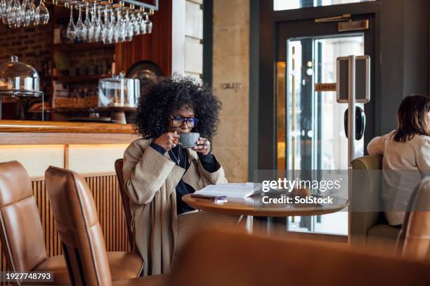 productive businesswoman in cafe - french food stock pictures, royalty-free photos & images