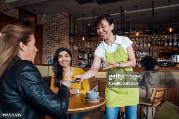 service with a smile - black knob stock pictures, royalty-free photos & images