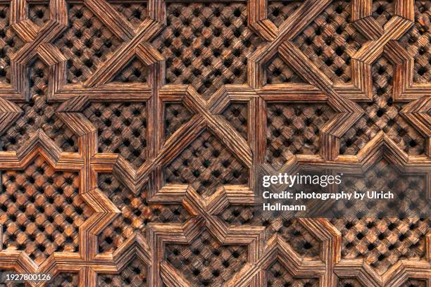 window barrier at medersa bou inania courtyard, fes, morocco - vintage embellishment stock pictures, royalty-free photos & images