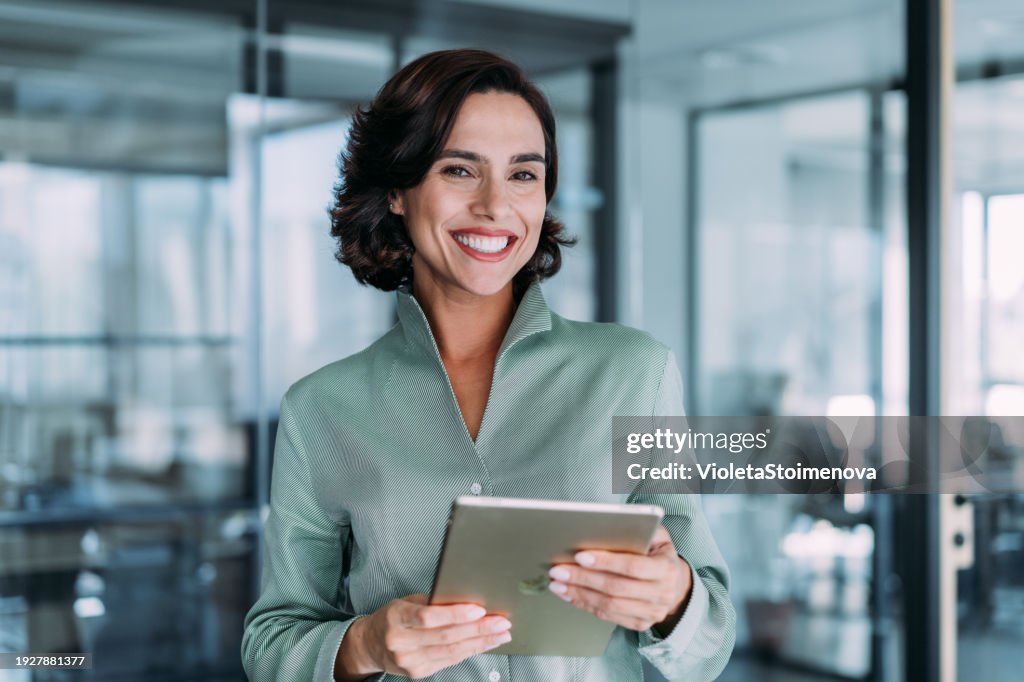 Confident businesswoman in modern office.