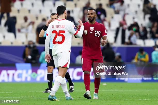 Ahmed Fathy Abdoulla of Qatar shakes hand with Hasan Srour of Lebanon after the AFC Asian Cup Group A match between Qatar and Lebanon at Lusail...