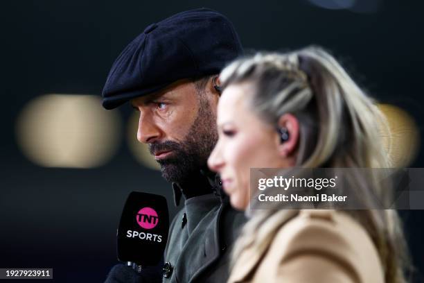Former English football player and current TNT Sports television pundit, Rio Ferdinand, looks on prior to the Premier League match between Burnley FC...