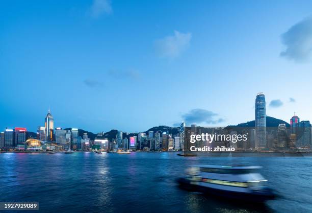 hong kong's central seascape at night - hong kong island stock pictures, royalty-free photos & images