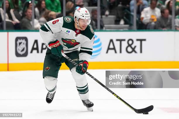 Dakota Mermis of the Minnesota Wild skates with the puck during the second period against the Dallas Stars at American Airlines Center on January 10,...