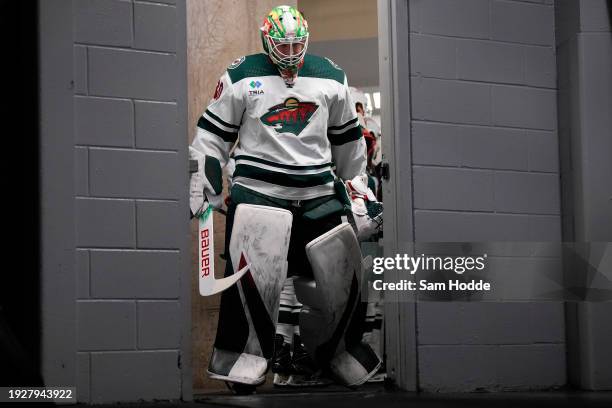 Jesper Wallstedt of the Minnesota Wild walks out to the ice before his NHL debut against the Dallas Stars at American Airlines Center on January 10,...