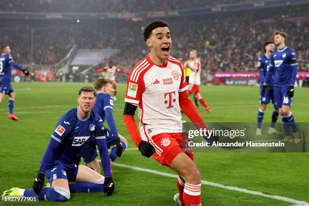 Jamal Musiala of Bayern Munich celebrates scoring his team's first goal during the Bundesliga match between FC Bayern München and TSG Hoffenheim at...