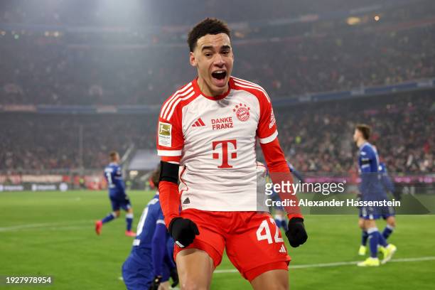 Jamal Musiala of Bayern Munich celebrates scoring his team's first goal during the Bundesliga match between FC Bayern München and TSG Hoffenheim at...