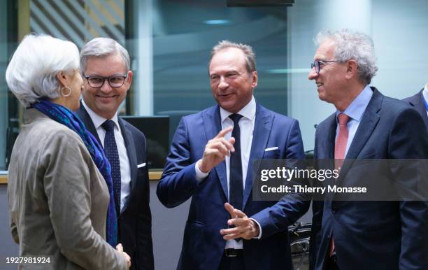 President of the European Central Bank Christine Lagarde is talking with the Austrian Finance Minister Magnus Brunner, the Luxembourg Minister of...