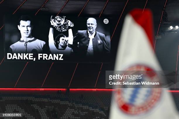 General view inside the stadium whilst a memorial image is displayed on the scoreboard after the passing of former German football player and...