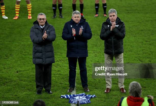 Norman Spain, Chairman of Bridgend Ravens , Tony Williams, Club Secretary at Bridgend Ravens and Lance Bradley, CEO of Ospreys, applaud following the...