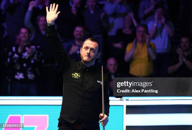 Mark Allen of Northern Ireland reacts to making a maximum break of 147 in his quarter-final match against Mark Selby of England during day six of the...