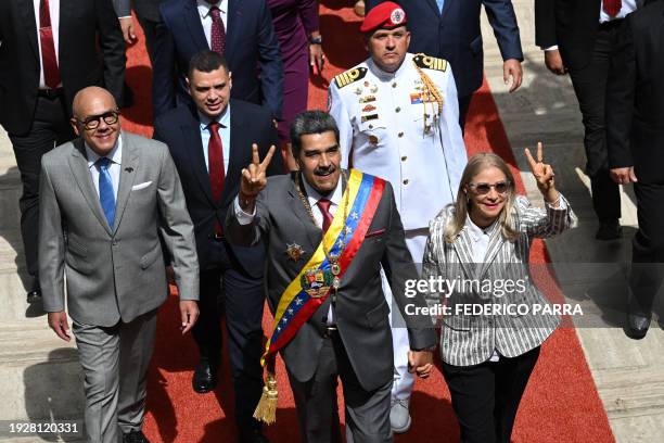 Venezuelan President Nicolas Maduro , accompanied by his wife Cilia Flores and National Assembly President Jorge Rodriguez , arrives at the National...