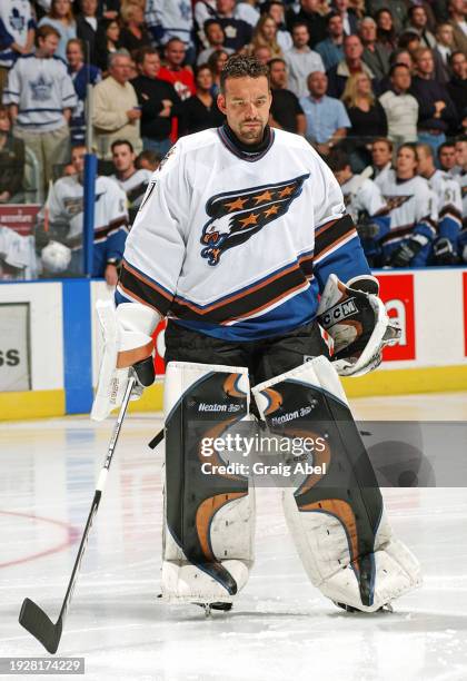 Olaf Kolzig of the Washington Capitals skates against the Toronto Maple Leafs during NHL game action on October 13, 2003 at Air Canada Centre in...