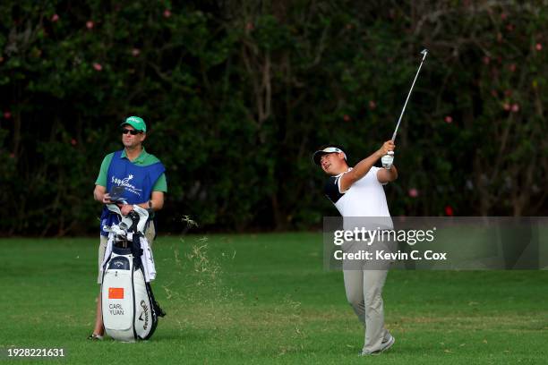 Carl Yuan of China plays a shot on the sixth hole during the second round of the Sony Open in Hawaii at Waialae Country Club on January 12, 2024 in...