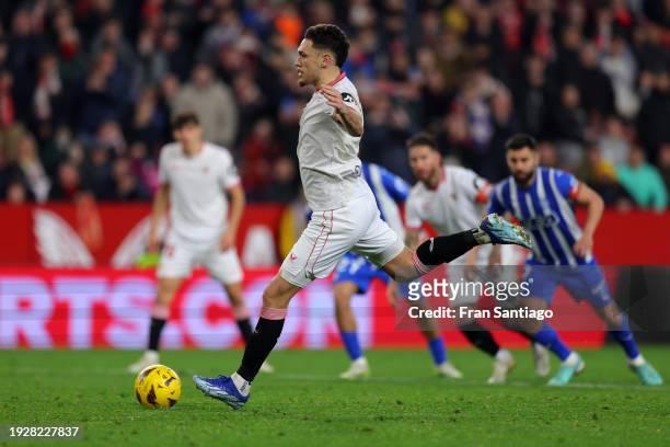 Lucas Ocampos of Sevilla FC scores his team's second goal from the penalty spot during the LaLiga EA Sports match between Sevilla FC and Deportivo...