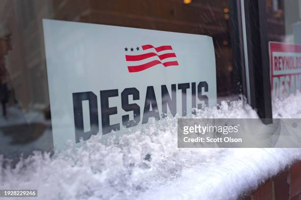 Campaign sign sits in the window as Republican presidential candidate Florida Governor Ron DeSantis speaks to Northside Conservative Club members...
