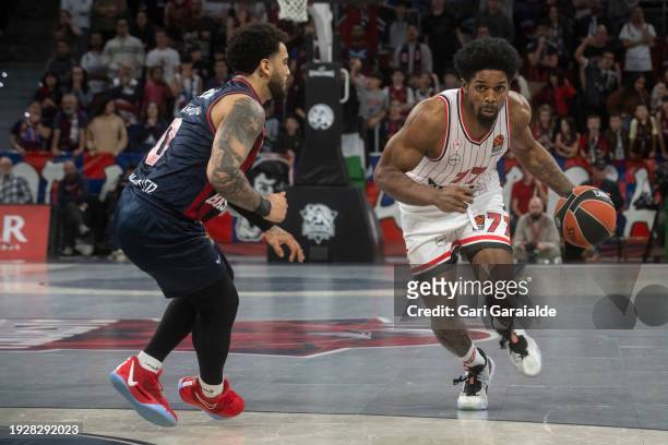Shaquielle Mckissic of Olympiacos Piraeus and Markus Howard of Baskonia in action during the Turkish Airlines EuroLeague Regular Season Round 21...
