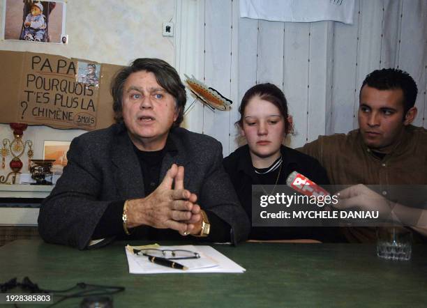 French defence lawyer Gilbert Collard and Priscilla Amri, wife of dead Tunisian worker Tarik Amri address the media in Argentan, Western France, 14...