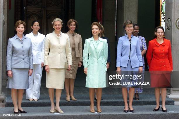 The participants at a presentation of social programs during a United Nations Conference on Financial Development, including US First Lady Laura...