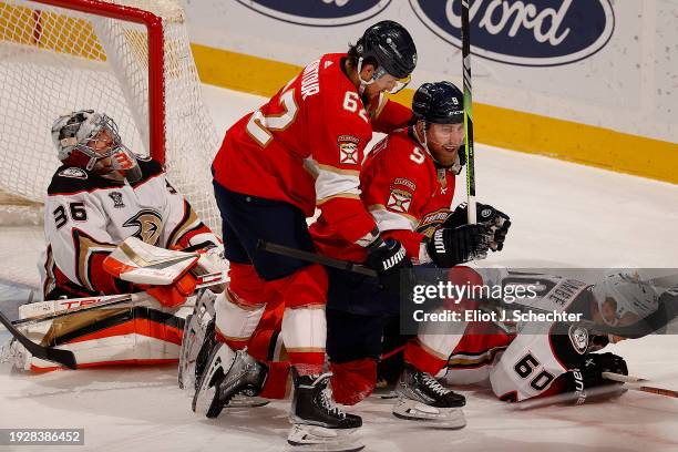 Sam Bennett of the Florida Panthers celebrates his second goal of the game with teammate Brandon Montour of the Florida Panthers against Goaltender...