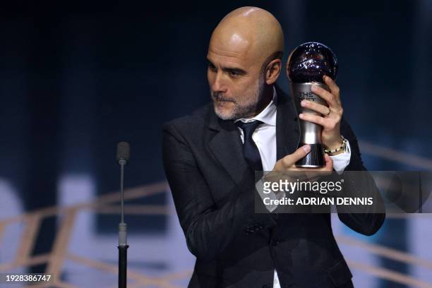 Manchester City coach Pep Guardiola receives The Best FIFA Men's Coach award during the Best FIFA Football Awards 2023 ceremony in London on January...