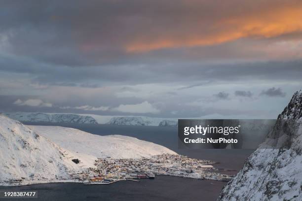 Panoramic view is showcasing the mountainous region and the harbors of Honningsvag in Mageroya, Norway, on January 9, 2024. Honningsvag is recognized...