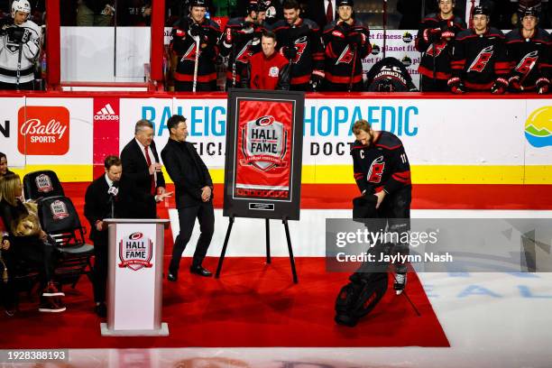 Former Hurricanes Captain right wing Justin Williams is inducted into the Hurricanes Hall of Fame, with Tracy Tripp presenting prior to the game...