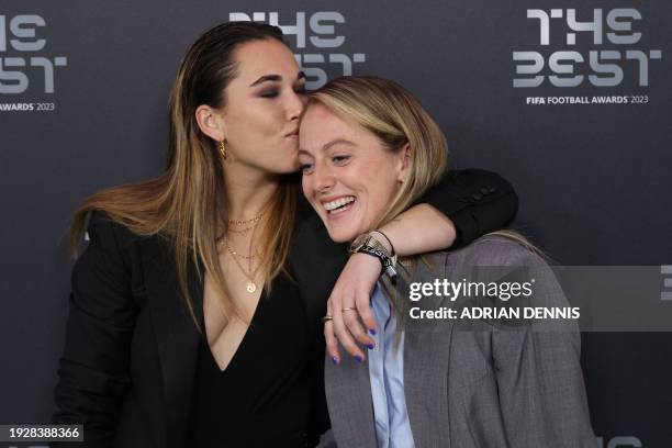 Spain and Barcelona goalkeeper Catalina Coll kisses England's Keira Walsh upon arrival to attend the Best FIFA Football Awards 2023 ceremony in...